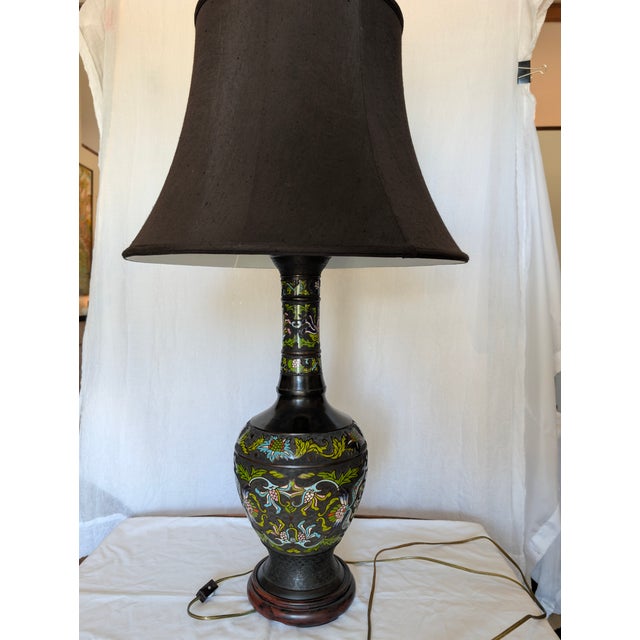 Beautiful vintage bronze Champlevé style lamp with intricate enamel decoration. The colors are vibrant, and they pop...