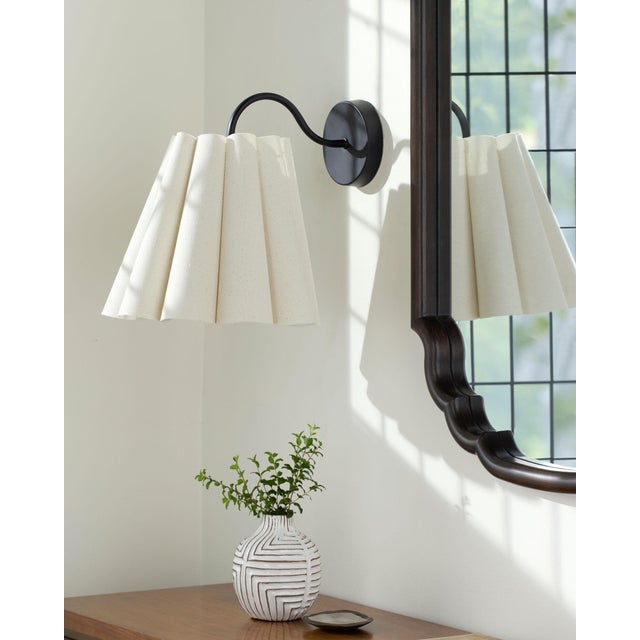 Introducing the Mirette wall sconce, a perfect embodiment of Arts & Crafts Traditional style that effortlessly elevates...