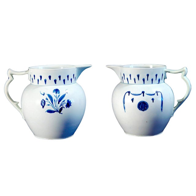 English Pearlware Pottery Large Underglaze Blue Jug with Flowers and Drapery Circa 1820–1830 This large English pearlware...