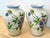 Pair of Hand‑Painted Gump’s San Francisco Vases — Floral Motif 10 Inches A beautifully matched pair of hand‑painted vases...