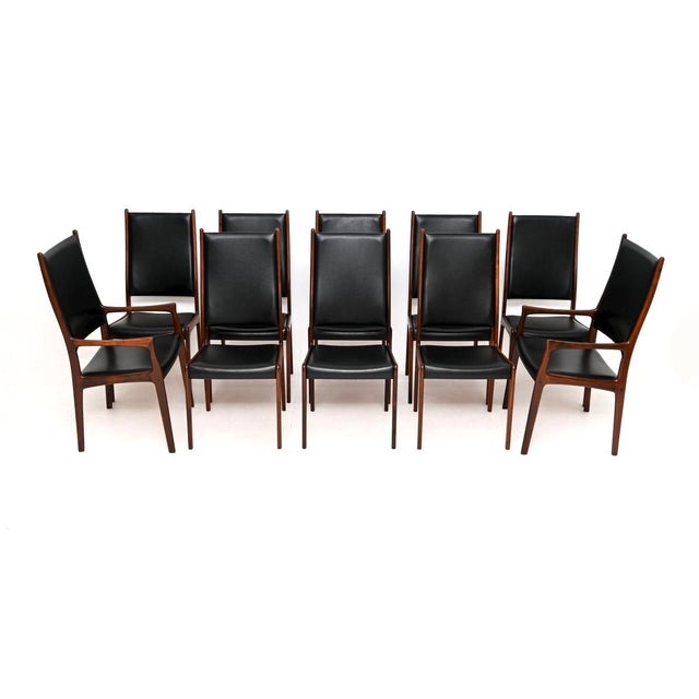 A stylish and extremely impressive set of ten Danish vintage dining chairs by Arne Hovmand-Olsen. They were made in...
