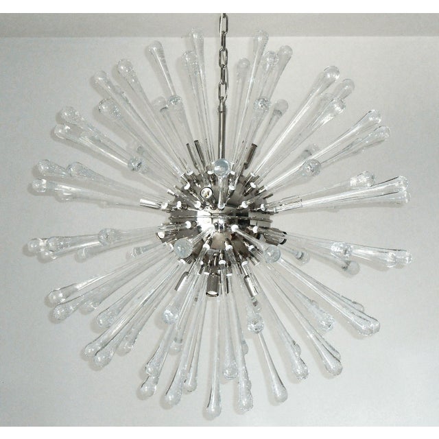 Italian modern Sputnik chandelier with clear drop shaped Murano glasses hand blown with bubbles within the glass in...