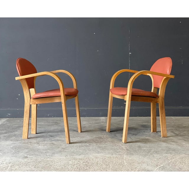 Sleek and timeless bentwood chairs with leather seats!