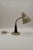 Swedish mid-century desk lamp, model 600/5 “Brigg,” produced by Gemi circa the 1960s. The metal shade and base are...
