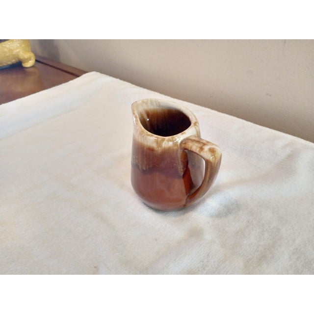 Vintage Stoneware Brown Drip Glaze USA 5" Pitcher. Pitcher is in excellent vintage condition without chips or cracks....
