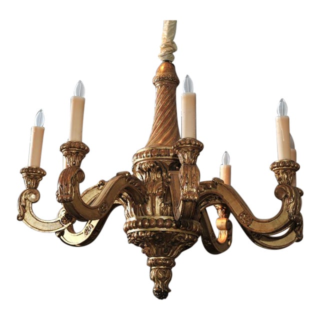 Eight Arm Carved Giltwood Chandelier For Sale