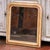 Decorate a powder room, bedroom, or entryway with this elegant antique wall mirror from France. Crafted circa 1870 in the...