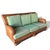 A beautiful woven rattan sofa from Henry Link. Classic transitional coastal style, this piece is beautifully woven with a...