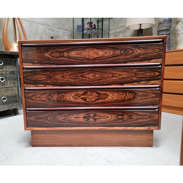 Exceptional book-matched wood grain in this Scandinavian Modern dresser by Westnofa. Norway circa. 1960's. Amazing...