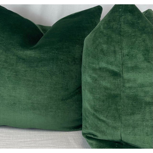 Custom pair of 22" pillows covered in a luxe linen velvet in an emerald green. These pillows have tapered corners to...