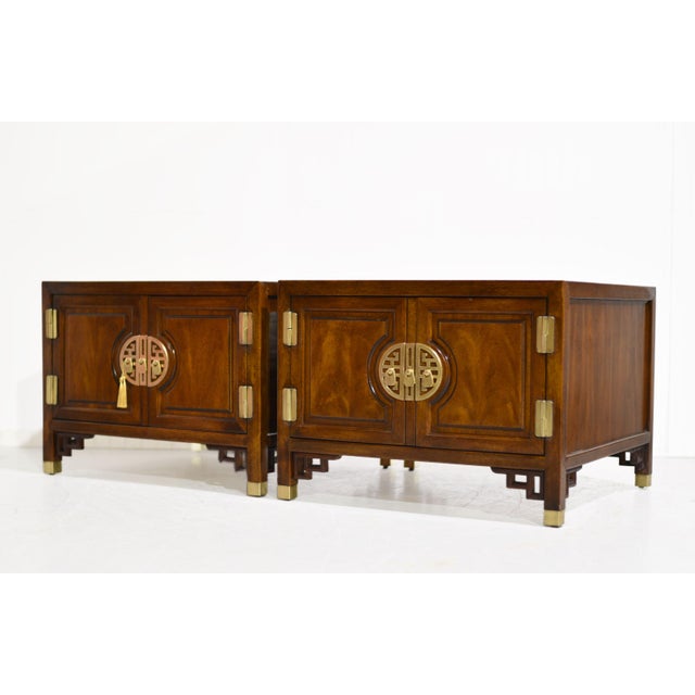Steeped in the romance of the Far East, this pair of 1970s side tables from Century Furniture's celebrated Cathay...