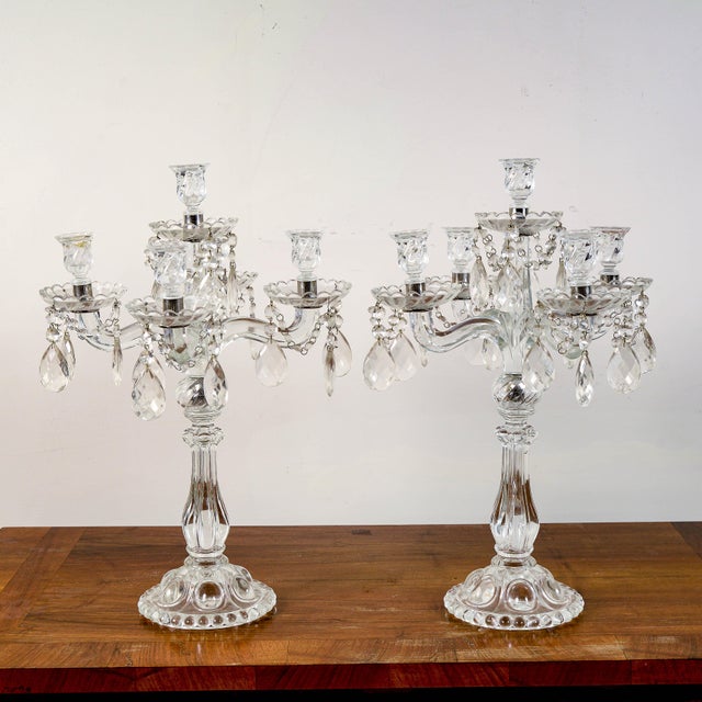 This refined pair of glass candlesticks dates back to the mid-20th century and represents a captivating example of period...