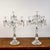 This refined pair of glass candlesticks dates back to the mid-20th century and represents a captivating example of period...