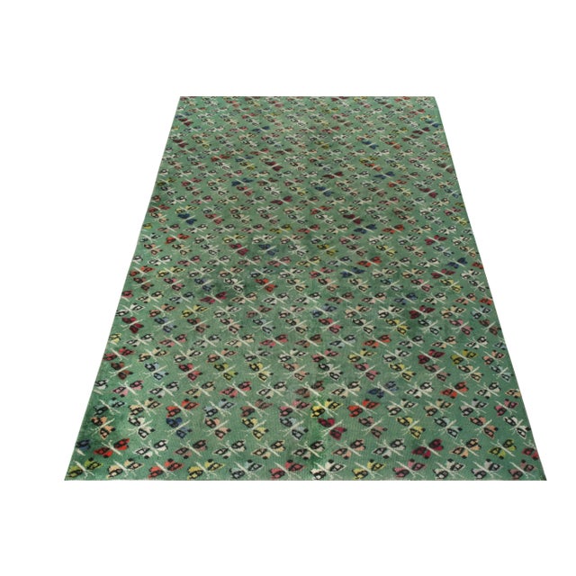 Hand-knotted in wool, a scintillating vintage 6x10 Art Deco rug from Rug & Kilim’s Mid-Century Pasha Collection featuring...