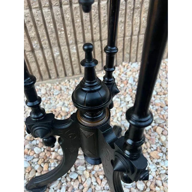Ebonized Renaissance Revival Plant Stand Vintage Well made 3 curved legs and gilt incised highlights. Approximate measures...