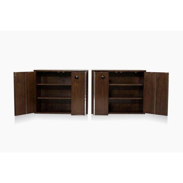 Elevate your interior with these exquisite mid-century floating cabinets, masterfully designed by the iconic Edward...