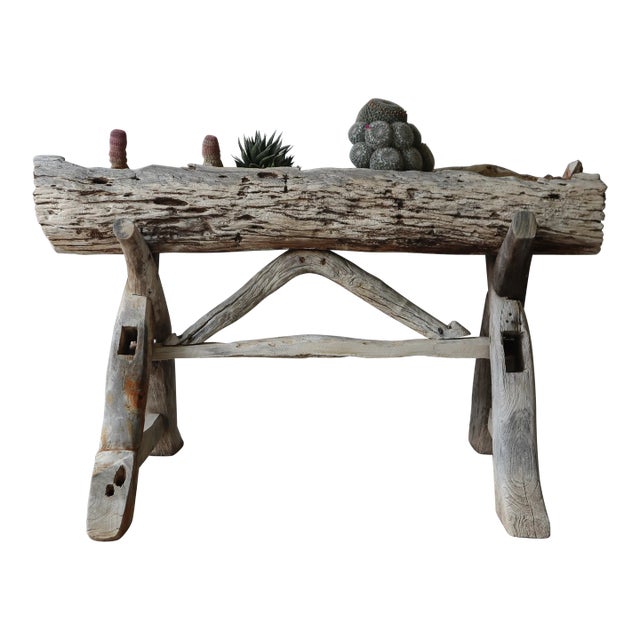 This rustic, weathered driftwood planter is great. Its that unexpected element that would add so much interest when placed...