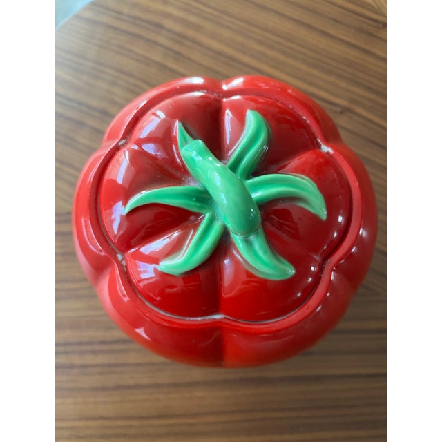 This kitschy vintage tom-ah-toe from the 1940s will brighten up any counter top or shelf. Fill it with your own sweet...