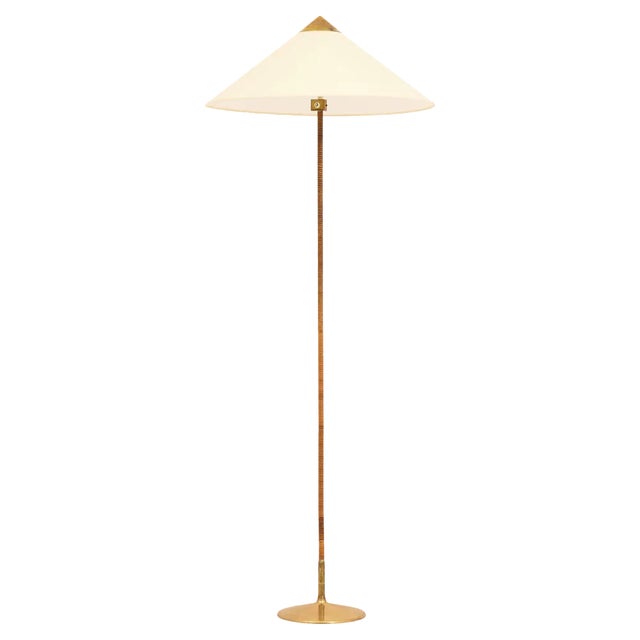 Floor Lamp in Brass and Cane attributed to Paavo Tynell, 1950s For Sale