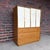 Harvey Probber Mid-Century Modern tall chest crafted in mahogany with distinctive leather and brass-accented sliding...