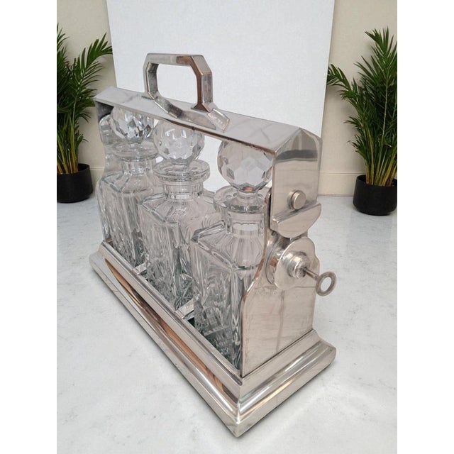 Original art deco silver plated tantalus with crystal decanters – c.1880s presenting a beautifully crafted art deco...