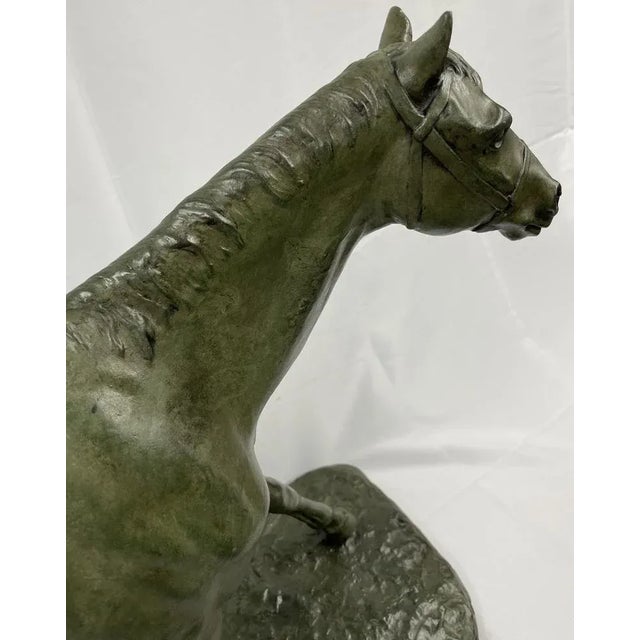 Horse walking in bronze with green patina. Signed on the base M.de Mathelin 1900. Maurice de Mathelin was a famous Belgian...