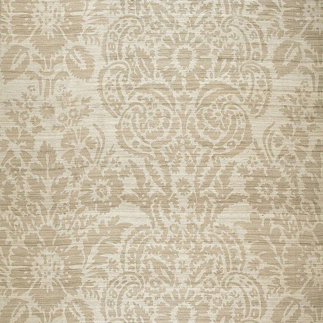 This soft damask design is screen printed by hand on a natural tussah silk ground. The use of raw silk yarns gives the...