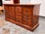 Design Plus Gallery presents a Sideboard from Bausman & Company. This sideboard has a wide silhouette with paneled doors...