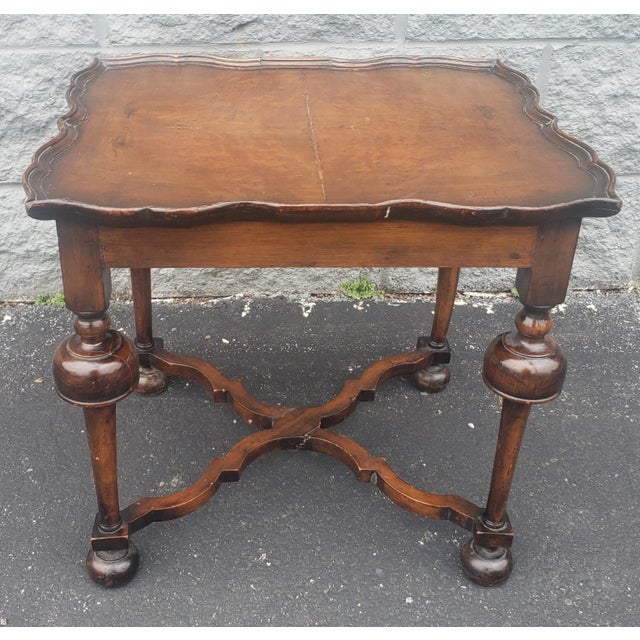 An exquisite Early American William and Mary Walnut and Burl Side Table dating from the 1890s. Nice walnut burled top with...