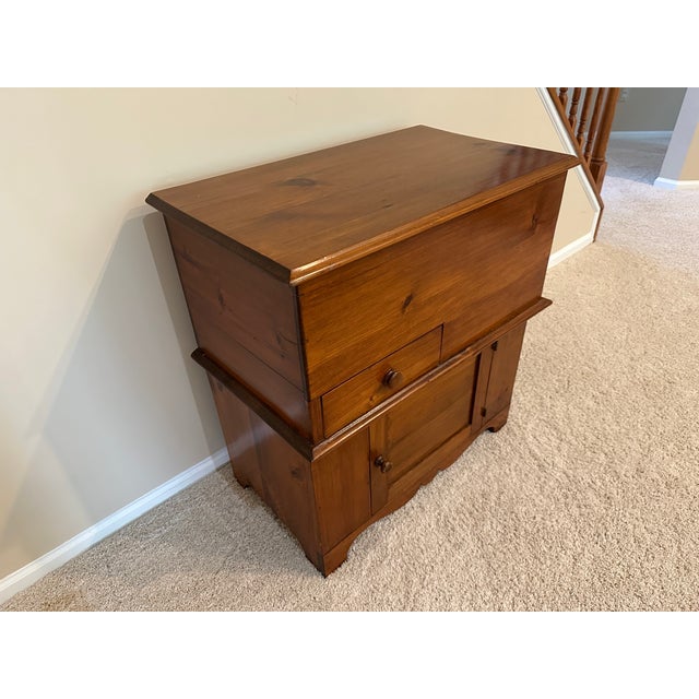 Beautifully maintained cabinet that adds charming storage space.