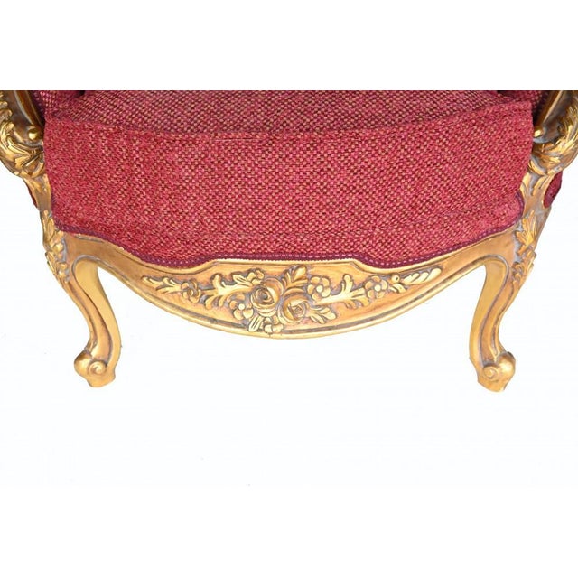 Elegant single French gilt salon chair in the Empire manner Hand carved frame finished in gilt for that gold effect Just...