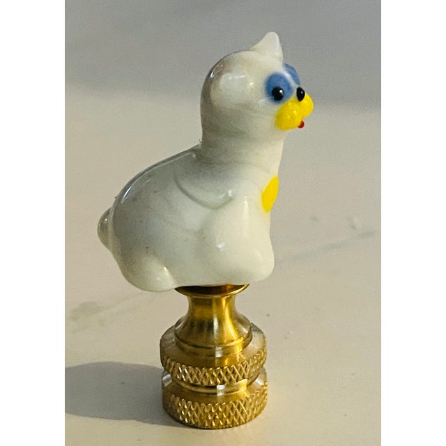 Blown art glass white cat figurine lamp finial bronze base.