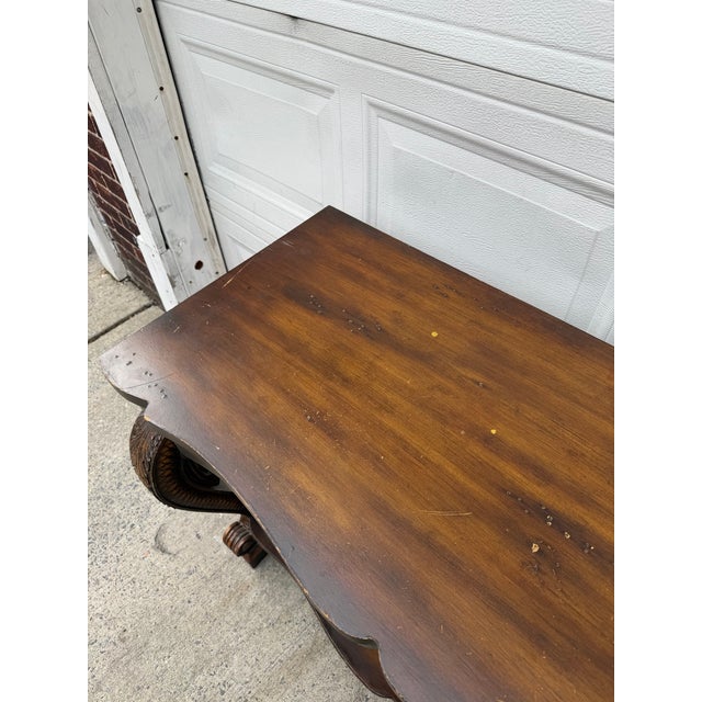 Brown Vintage Neoclassical Revival Console Table With Ornately Carved Scroll Supports and Lower Shelf For Sale - Image 8 of 12