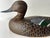 Decorative wood-carved Green-winged Teal hen or Garganey hen, has a distinctive green speculum patch on its wing and the...