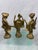 Trio of Mid Century Modern Iron Geisha Girl Dancing figures. These are painted gold. They are 8" tall.