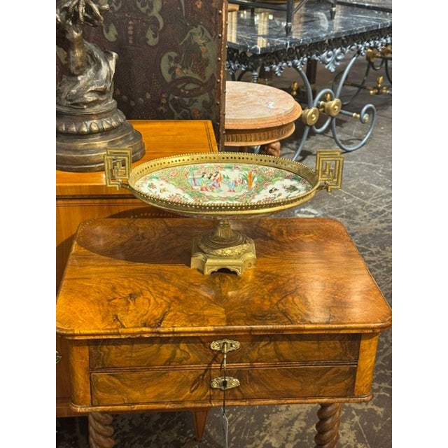 This 19th century French Rose Medallion and Gilt Bronze Centerpiece is a stunning piece of dining room decor, perfect for...