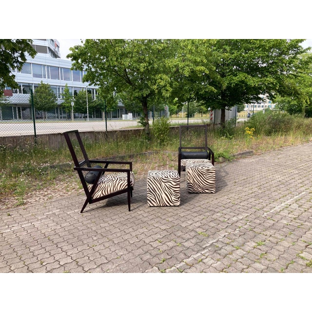 Rare and highly sought-after Astoria HB lounge chair, designed by Franco Bizzozzero in 1999 for Bonacina 1889. The Astoria...