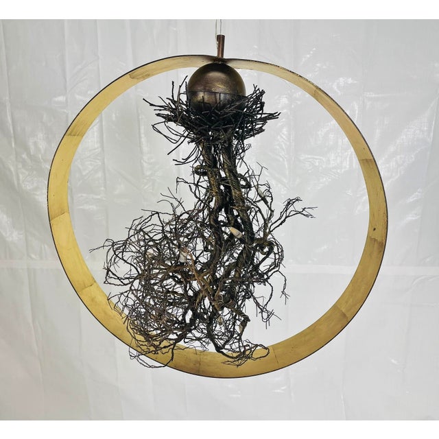 A dramatic and meticulously handcrafted “Roots” sculptural pendant light designed and manufactured in Greece by F+M FOS...