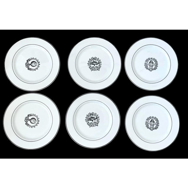 This vintage set of 6 hand-painted fish dinner plates in black and white features a square and round shape, measuring 10.5...
