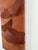 This piece, made of layered leather, evokes the red desert mountains you can see in the western states of America. It...