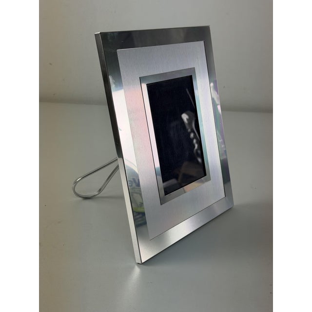 Italian metal photo frame, 1970 External dimensions: 21.5 x 26.5 cm. Photo compartment: 9 x 13 cm. Good condition.