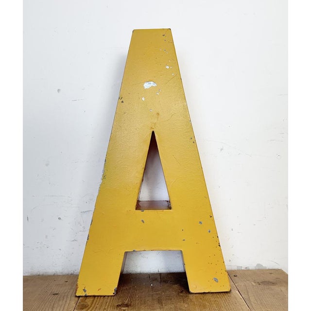 This vintage industrial facade letter “A” was made during the 1960s in former Czechoslovakia and comes from an old...