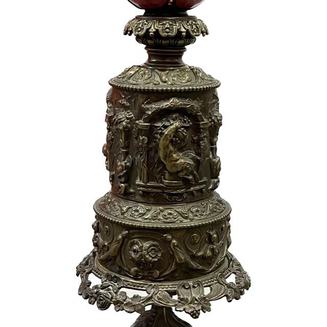 1 pair of late 1800'S bronze oil lamps that were electrified with an early 1920's cranberry hand blown glass slag 4 petal...