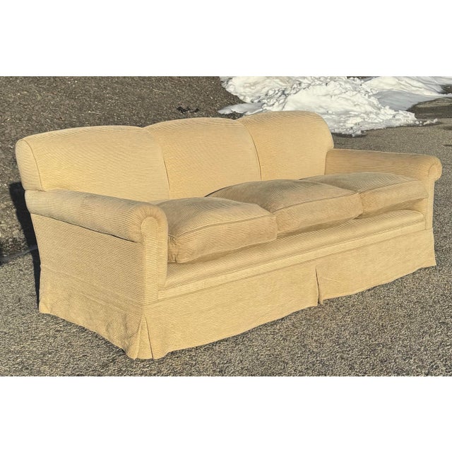 George Smith Full Scroll Arm Sofa with right back and down seat cushions. The sofa is in a pale yellow corduroy fabric and...