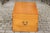 An Asian camphor wood box from the early 20th century, with traditional lockset on medallion and lateral handles. This...