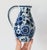 Vintage blue and white pitcher with floral motif. Made in Holland by Delft. Could also serve as a small floral vase....