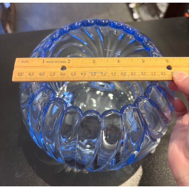 The Cambridge Blue Caprice Moonlight Footed Large Rose Bowl is a beautifully crafted piece of glassware by the renowned...