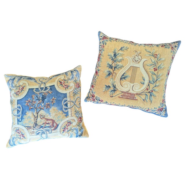 A PAIR of Jules Pansu Paris Tapestry Pillows Made in Paris, France One Pillow features an Animalia motif of a Fox, while...