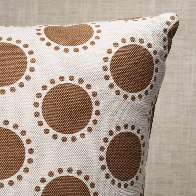 This pillow features Oompa by Studio Bon with a knife edge finish. With graphic offset polka dots encircled by diminutive...