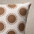 This pillow features Oompa by Studio Bon with a knife edge finish. With graphic offset polka dots encircled by diminutive...